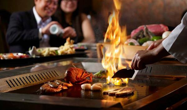 Flames at the teppanyaki grill